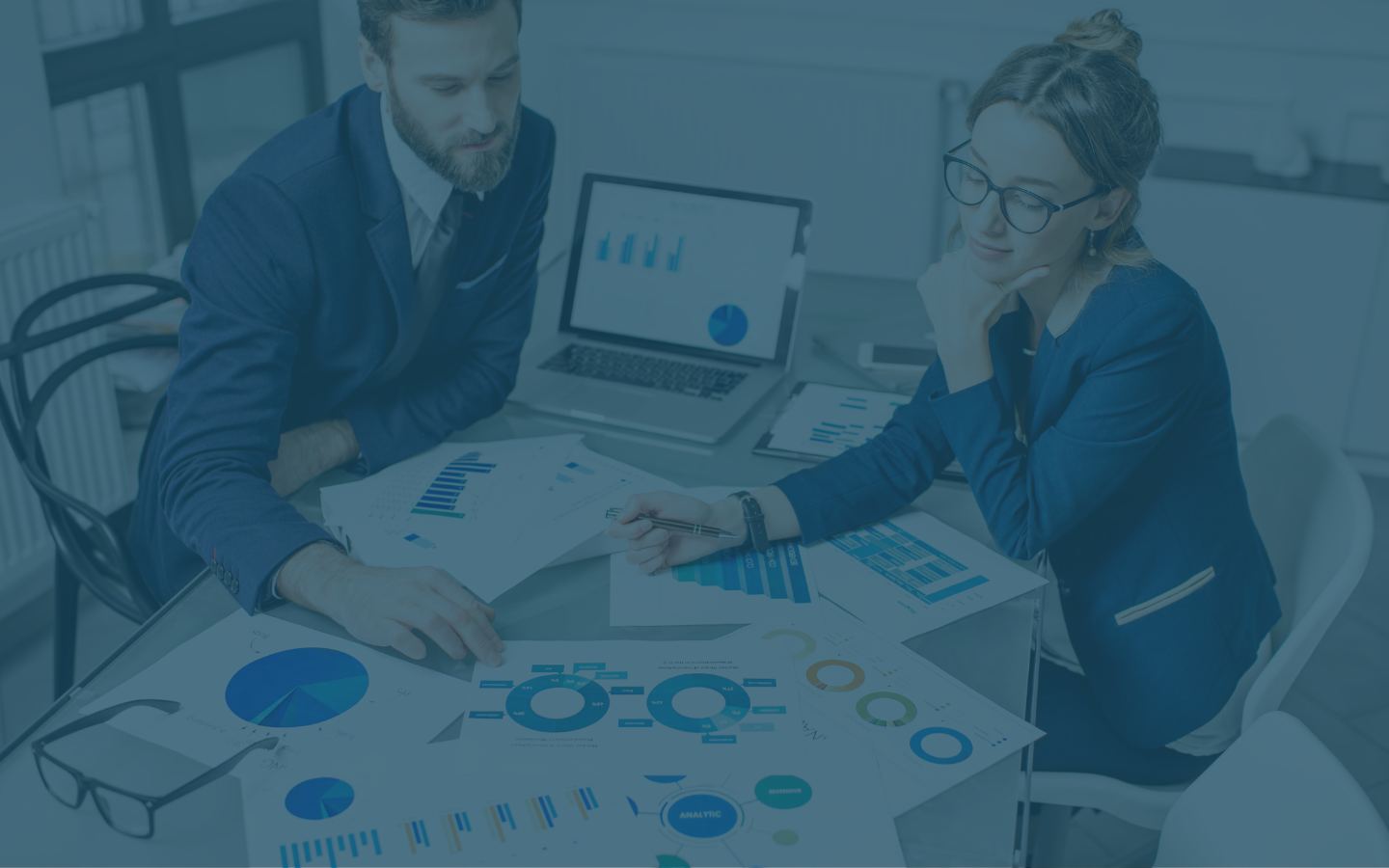 Background of two people working on Financial procedures